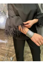 Жіночий костюм з пір'ям