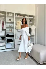 Сукня довжини міді