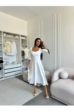 Сукня довжини міді
