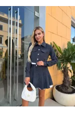 Жіночий костюм зі спідницею-шортами
