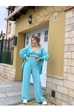 Костюм з топа, сорочки та штанів-палацо