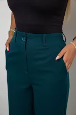 Штани жіночі однотонні класичні, колір зелений